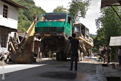 NuJiang Valley.  Front end loader.  Turns out to be a display of skill.