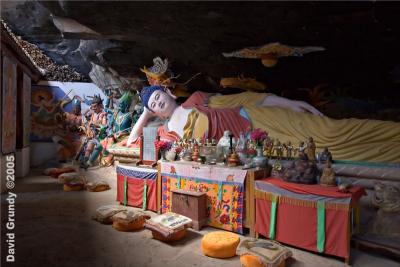ShiBaoShan - BaoXiang Temple.  Seems a bit crowded in there.  And there's a dragon flying through the rock in the ceiling.