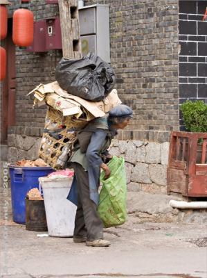 LiJiang - old city.  Rubbish collection part 1.