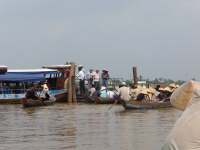 The canal led us back into the Mekong River, where we switched to a larger boat.