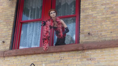 Hanging out the window of the Red Garter Inn is this mannequin, which is a depiction one of the original bordello girls.