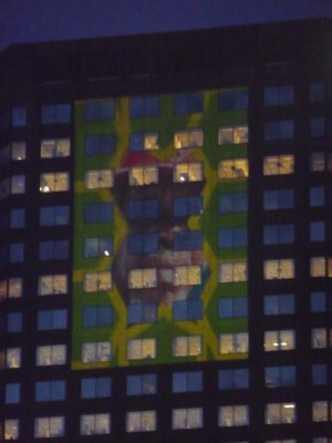 While the performance was going on, images in light were reflected on some of the surrounding buildings.