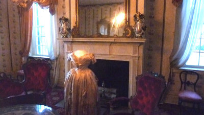 View of other furnishing in the salon and of the fireplace. The house was heated by the fireplaces when Polk lived here.