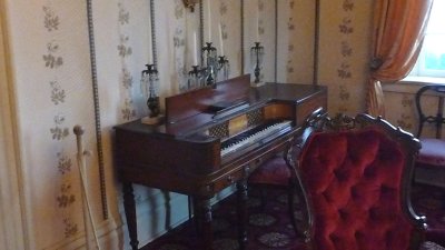 An original piano that belonged to the Polk family.