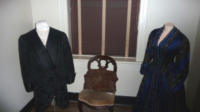 This was originally a trunk room or a storeage room. These are the President's smoking jacket and one of Sarah's dresses.