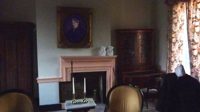 In this bedroom, is a portrait of Sarah painted 30 years after James death, looking like she was still in mourning.