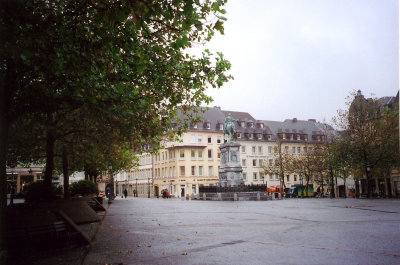 View of Place Guillaume with a statue of William II on horseback.