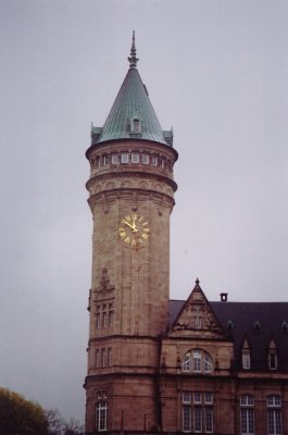 Close-up of the clocktower of la Banque et Caisse d'Epargne.