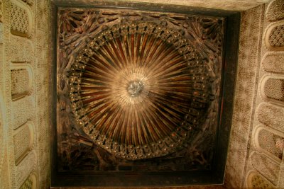 A 14th century ceiling design in the medrassa of the sun and moon.  It is made of cedar.