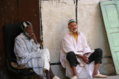 These two Moroccan men were having a pleasant afternoon taking a break in the medina in Fès.