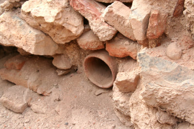 A pipe that leads into the cistern which is similar to what was used in Roman times.