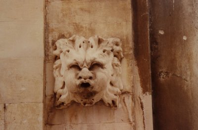 A whimsical face on an old Dubrovnik wall near the Guard House.