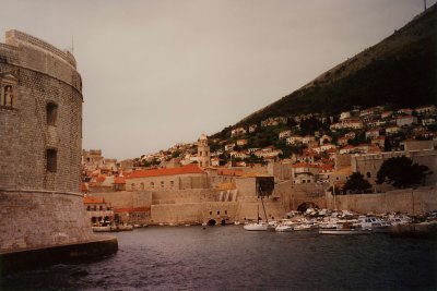 Side view of Fort St. John with the harbor along the Old Port of Dubrovnik in the background.