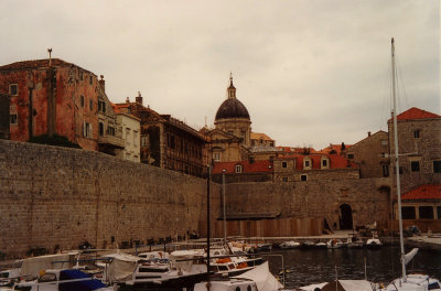 Another view of the Old Port with Dubrovnik's fortified walls and Cathedral of the Assumption in the background.