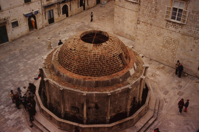 A view looking down at the big Onofrio fountain from the rampart walls surrounding Old Town.
