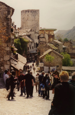 Pedestrians and tourists were walking down this narrow street in Mostar.
