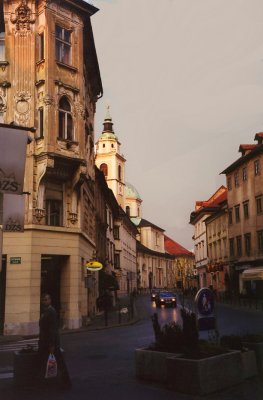 A Ljubljana street scene in Town Square at dusk.