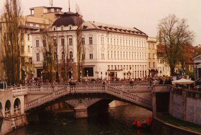 View of the Triple Bridge which crosses the Ljubljanica River.  The original is in the middle flanked by 2 more recent bridges.