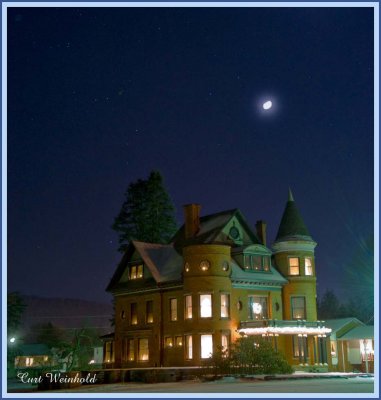 Lewis mansion under moon
