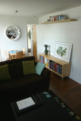 living and dining room (fresh paint, new floor, new light fixture, new shelf)