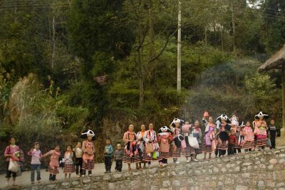 Villagers seeing tourists off