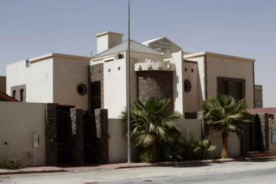 A fairly typical home in Riyadh. Many have three doors, one for males, one for females and one for families entering together.