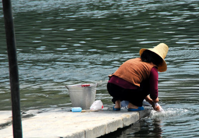 Guilin - doing the daily wash