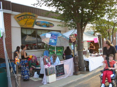 One of the many booths set up during the Fringe on the street on or near Whyte Avenue