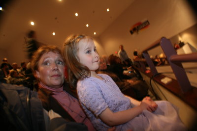 Auntie and cousin awaiting the grads