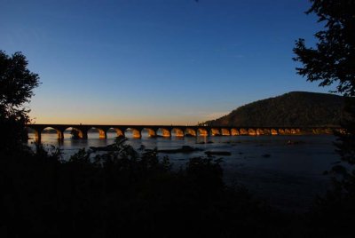 Sunrise Catches the Arches of the Rockville Bridge