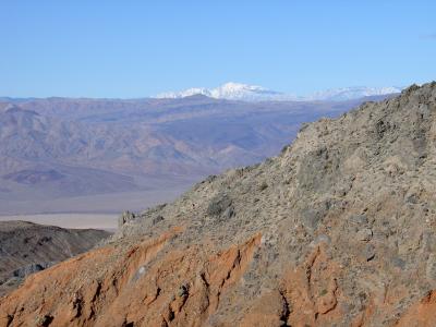 In the background, snow on the peaks