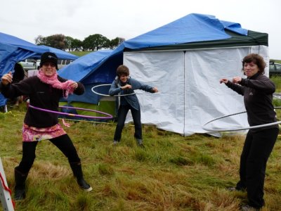The rain stopped for a moment to let Henri, Kate and Jill show off their hula hoop skills.