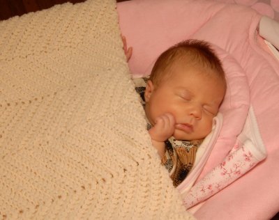 Stella Enjoying Jean's Handmade Blanket