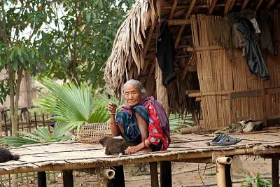 Tangsa lady on her porch