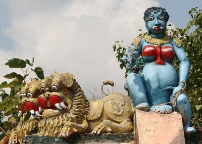 Pregnant goddess on the roof of a Kaliamman temple, Tamil Nadu http://www.blurb.com/books/3782738.