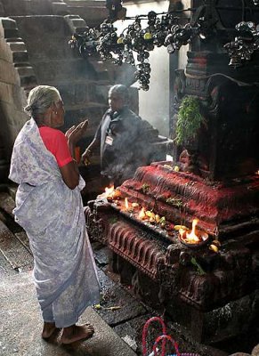 Devotee at Sri Ranganatha temple in Srirangam, Tamil Nadu.