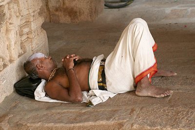 A priest sleeping in the Ranganatha temple in Srirangam, Tamil Nadu.
