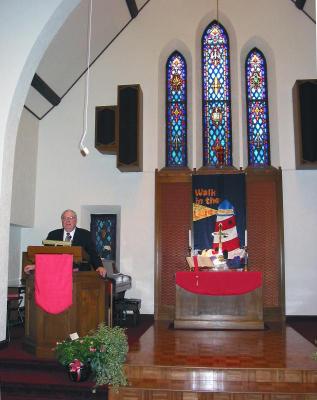 Bob in Pulpit of Wesley Methodist Church in Mason City, Iowa