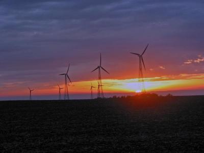 Sunset and Power Windmills in Northwest Iowa