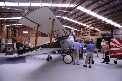 Marlborough aviation restoring workshop visit standing around the Peggy NZ