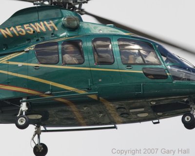 Wayne Huizenga arriving in his helicopter.