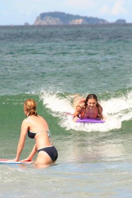 body surfing in front of the house