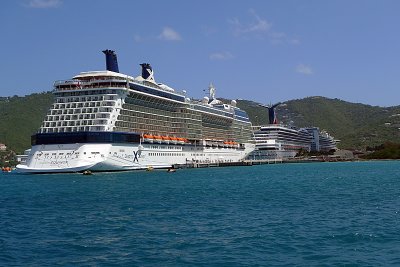 Celebrity Equinox behind a Carnival ship