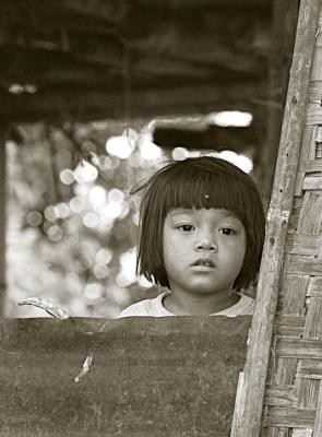 Girl at window, Inle, Burma