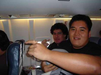 how do the two biggest people on the plane get seated next to each other???