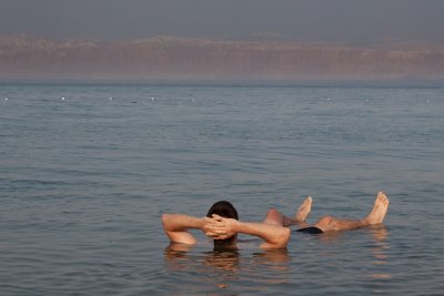 Floating in the Dead Sea at sunrise.