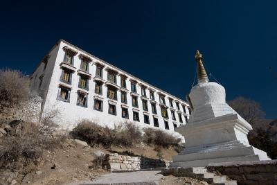 Stupa and living quarters at the entrance to Drepung Monastery.