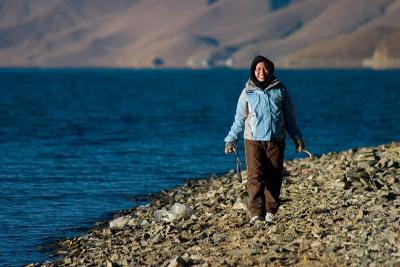 Aldri walking along the lakeside.