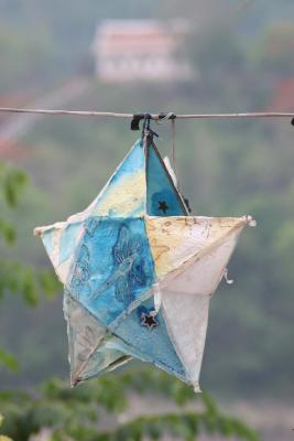 Lao Paper Star (with Wat Long Khoun in background)
