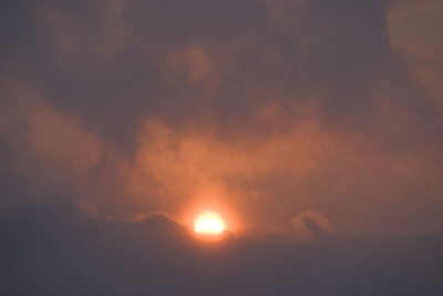 THE SUN IN THE CLOUDS 1